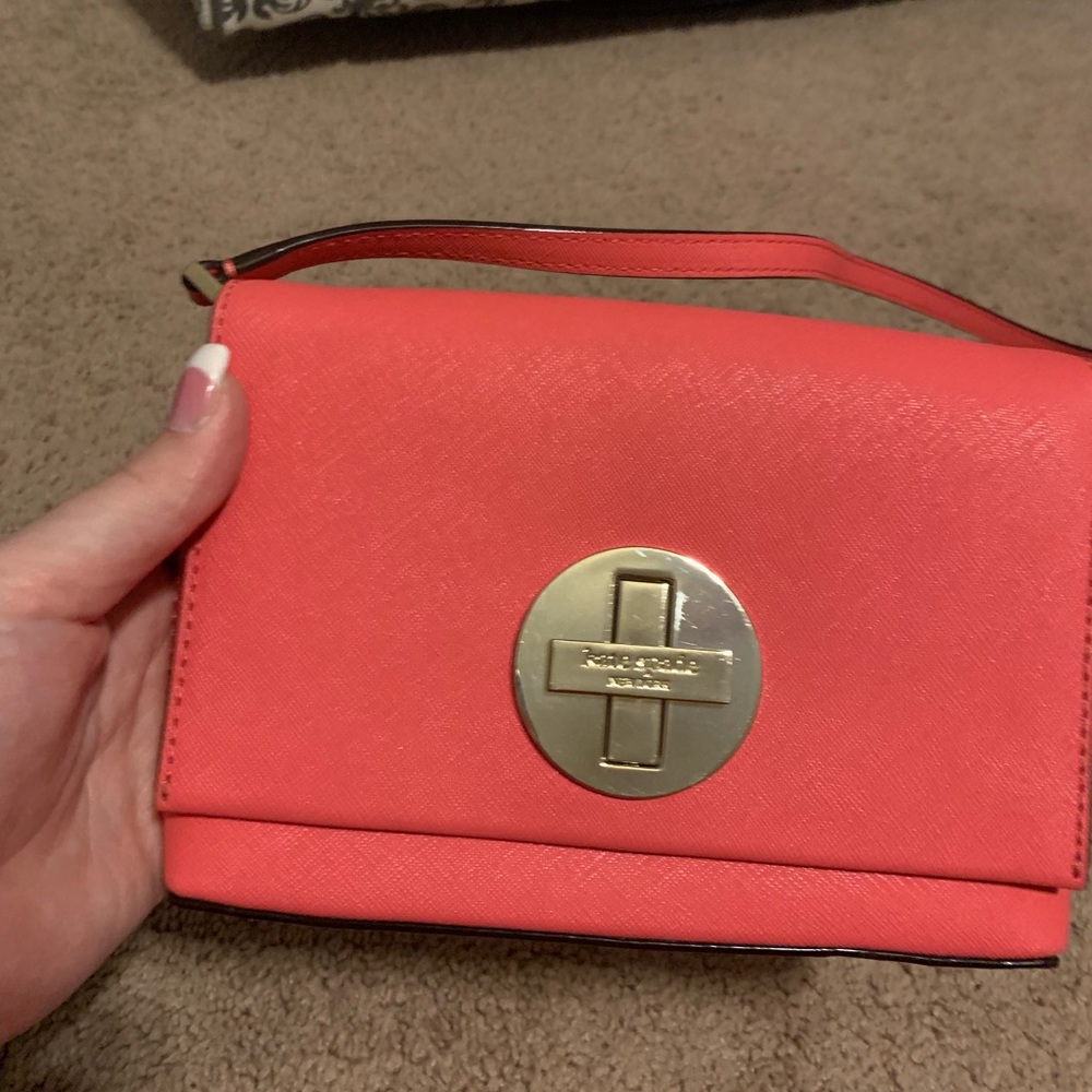 Kate Spade coral crossbody purse.